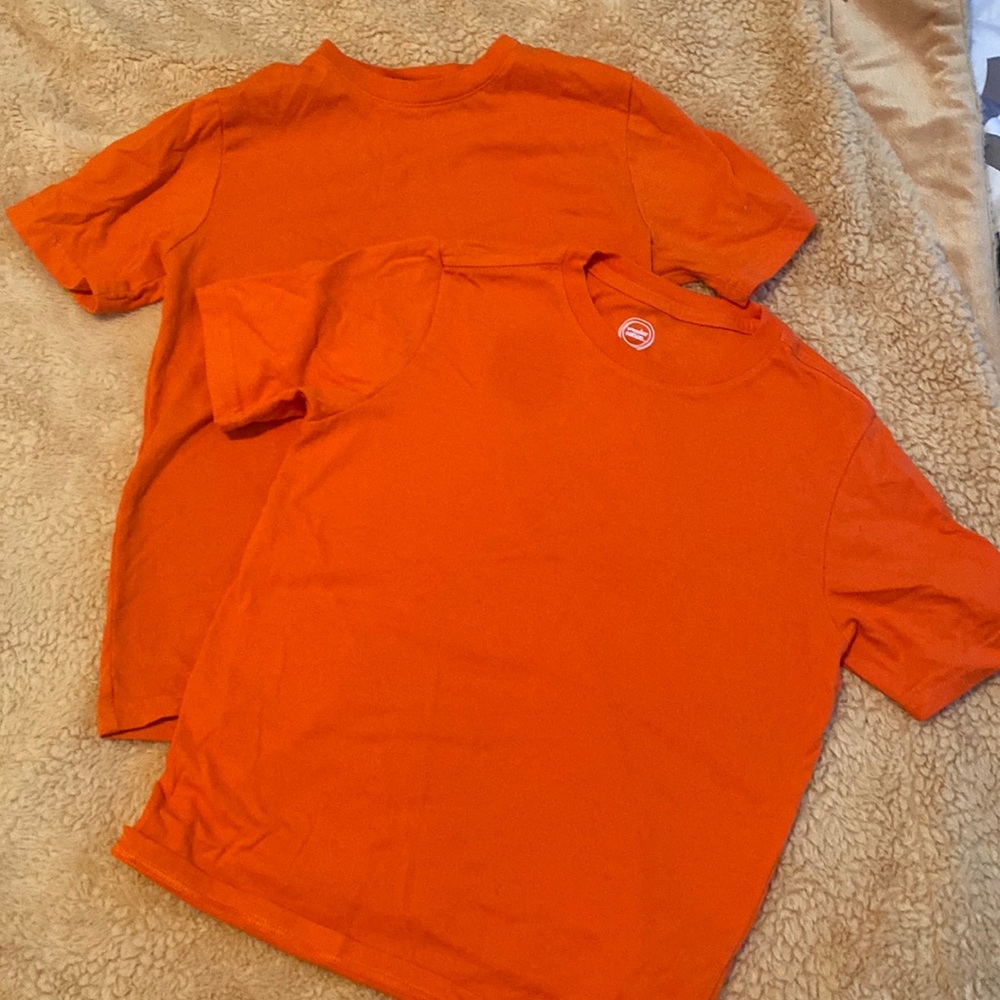 2 kids shirts. Orange. Size medium